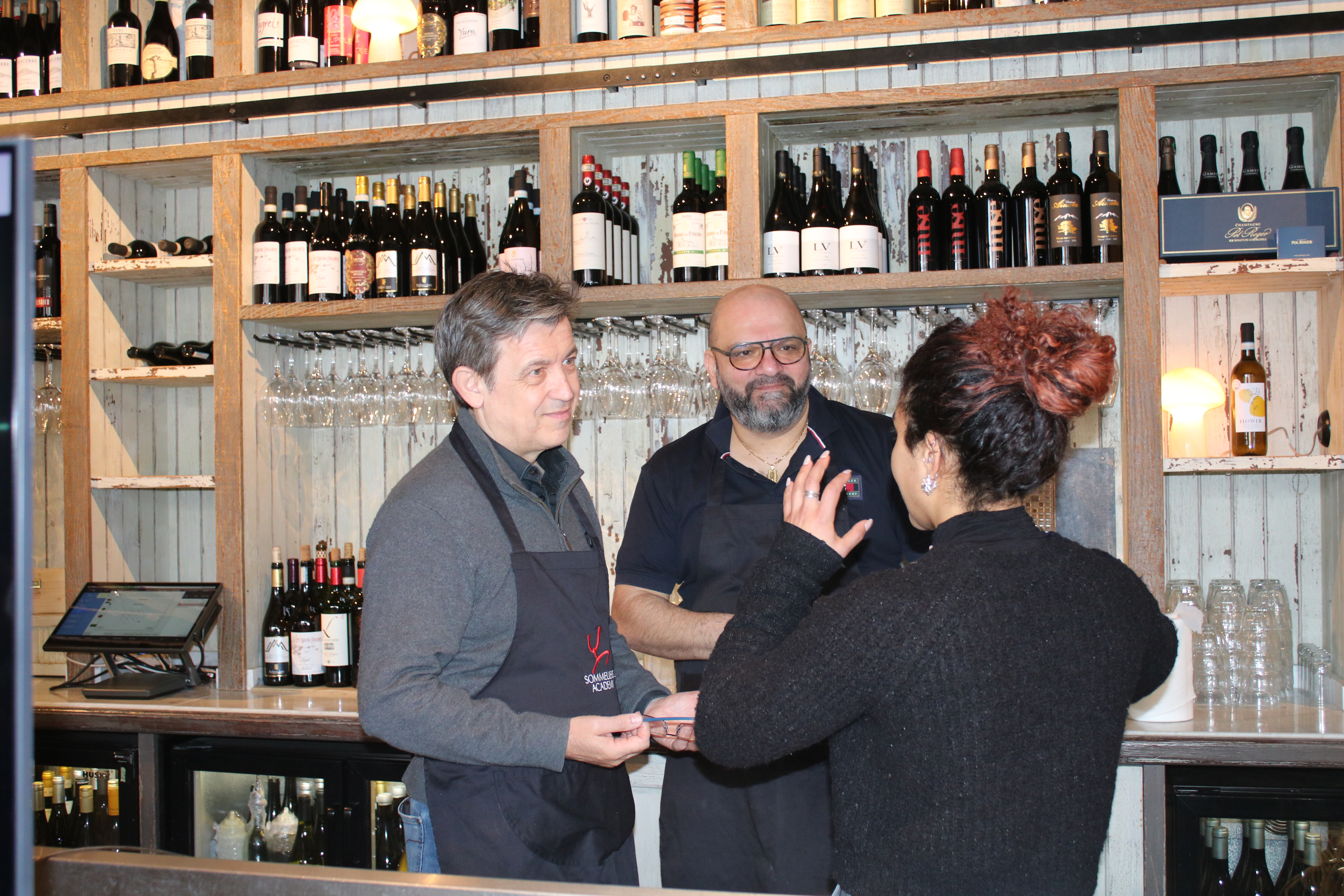 Instructors and students in conversation